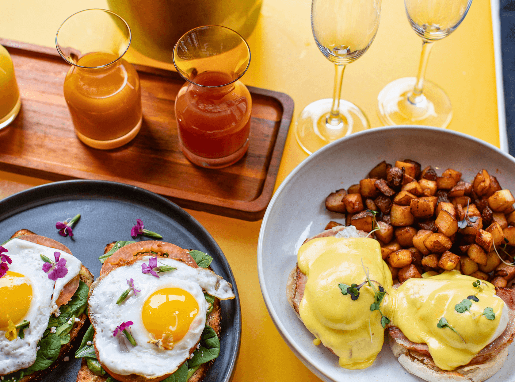 Brunch Image with eggs, juices, and eggs Benedict